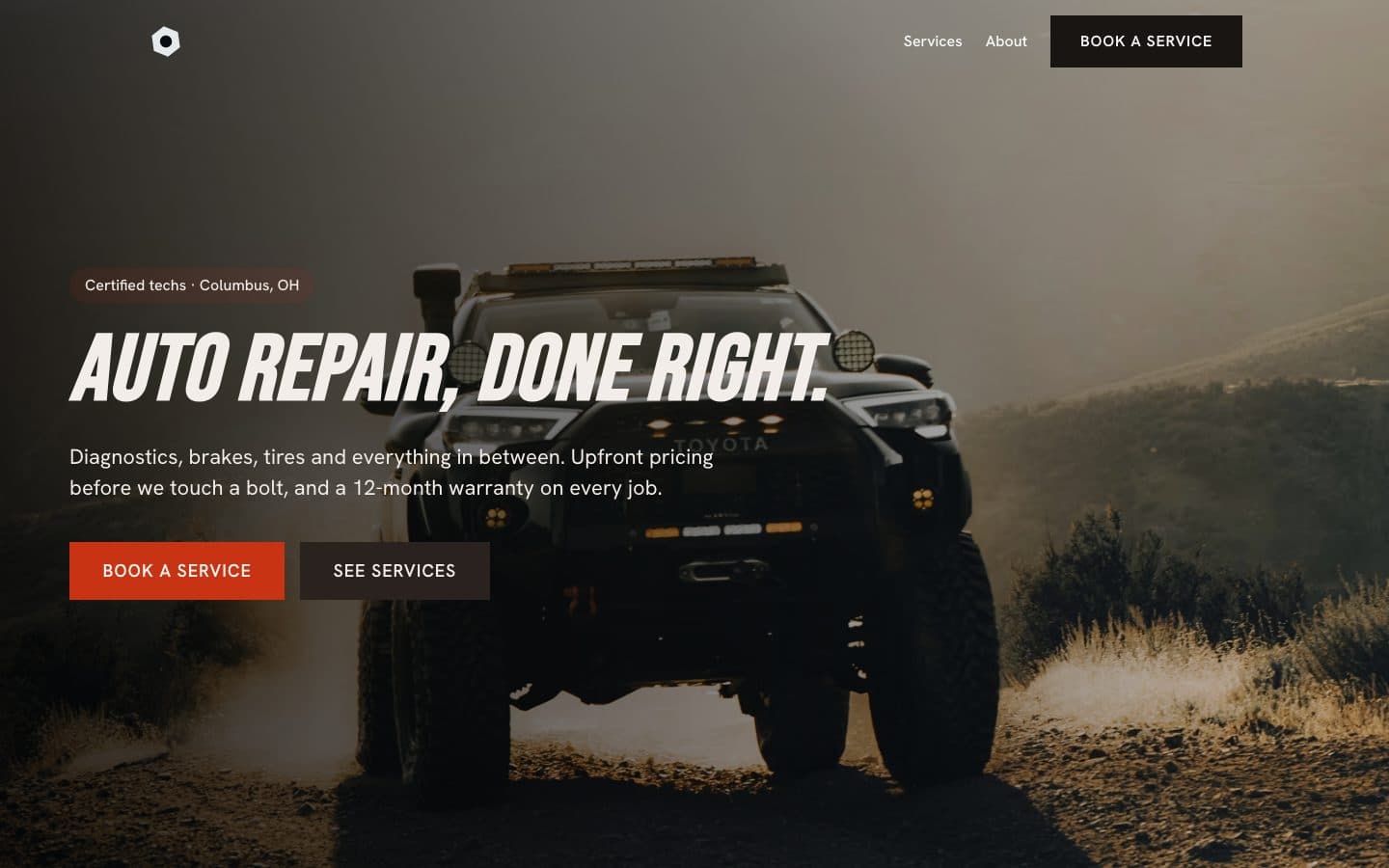 Camber, an auto repair site: dark hero with bold condensed headline over a truck on a dirt road